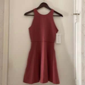 Athlete mini dress with pockets. New with tags on. Mauve color.